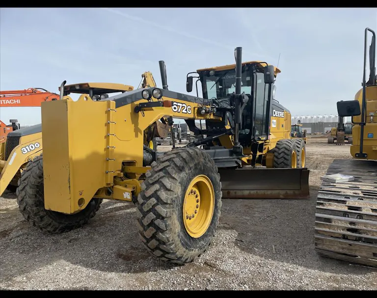 A John Deere 672G motor grader, such as the one use by the heavy equipment technician in the attached video.